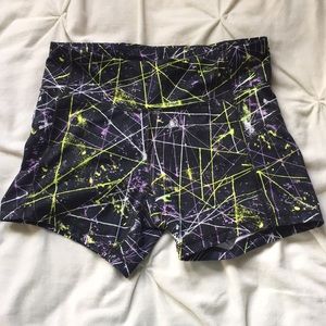 Champion black, green/yellow, and purple spandex